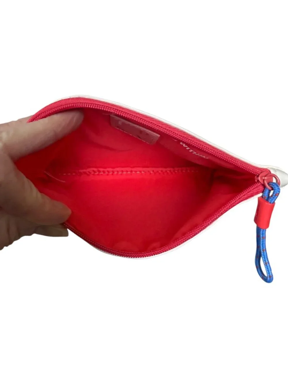 IPSY cream colored zippered cosmetic bag pouch with red interior